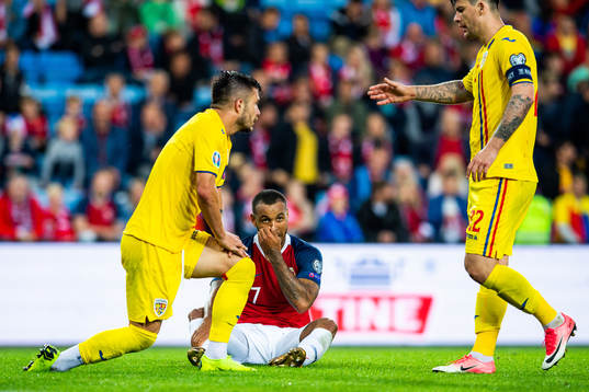 Joshua King of Norway looks dejected