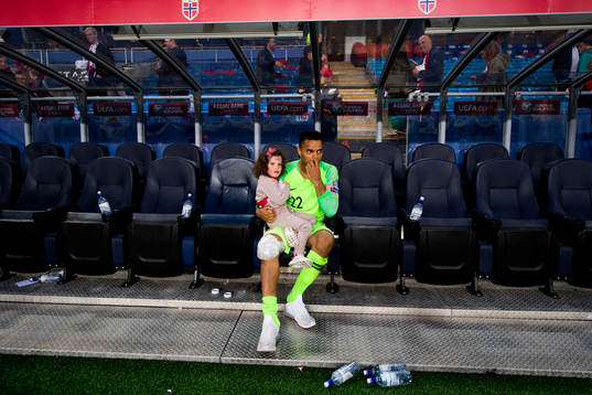 Goalkeeper Sten Grytebust of Norway looks dejected together