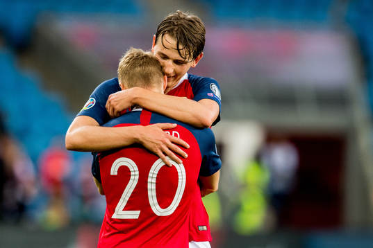 Martin Ødegaard of Norway celebrates with teammate Sander