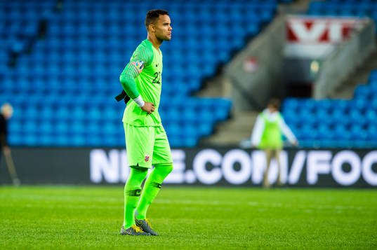 Sten Michael Grytebust of Norway looks dejected