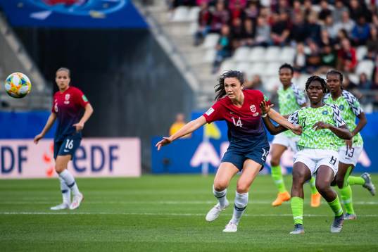Ingrid Syrstad Engen of Norway and Asisat Oshoala of Nigeria