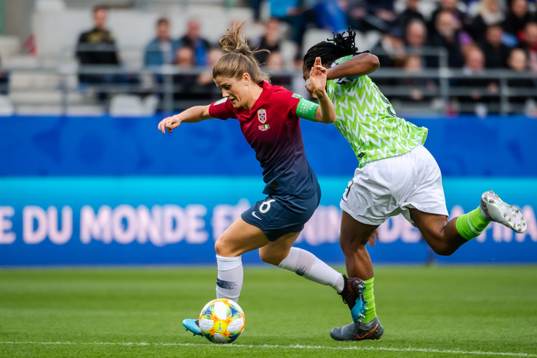 Maren Nævdal Mjelde of Norway and Desire Oparanozie of
