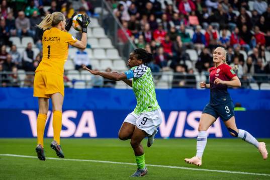 Goalkeeper Ingrid Hjelmseth and Maria Thorisdottir of