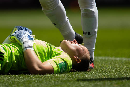 Goalkeeper Almuth Schult of Germany in pain