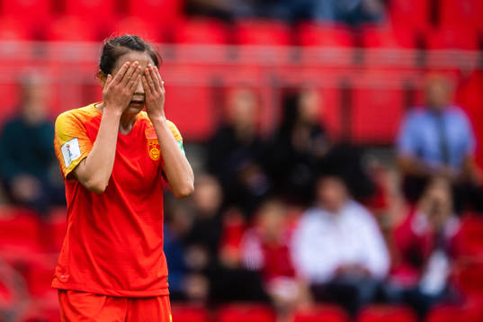 Li Yang of China looks dejected