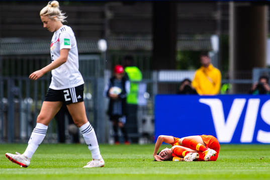 Jiahui Lou of China in pain §during the FIFA Women's World