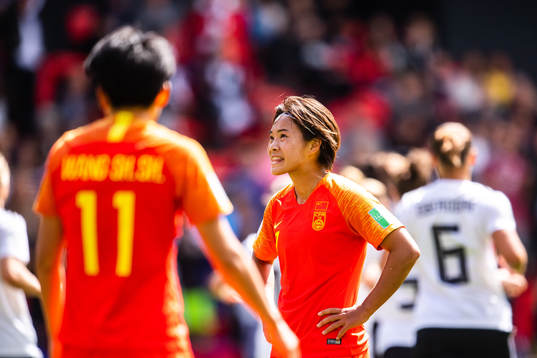 Shuang Wang of China looks dejected