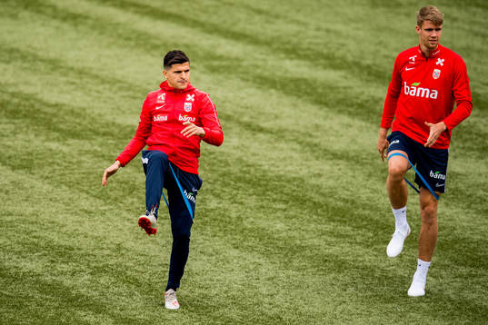 Tarik Elyounoussi and Kristoffer Ajer of Norway