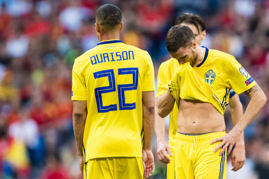 Robin Quaison and Marcus Berg of Sweden looks dejected
