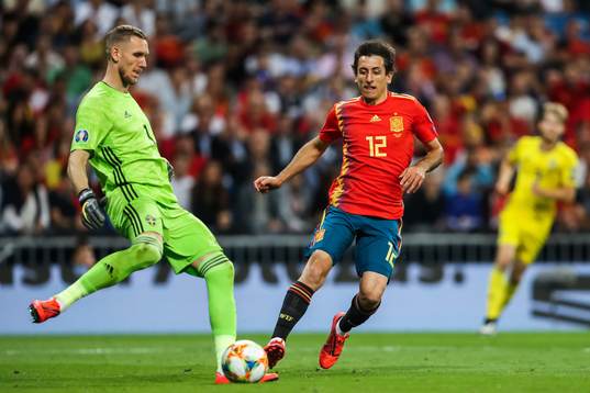 Goalkeeper Robin Olsen of Sweden and Dani Carvajal of Spain