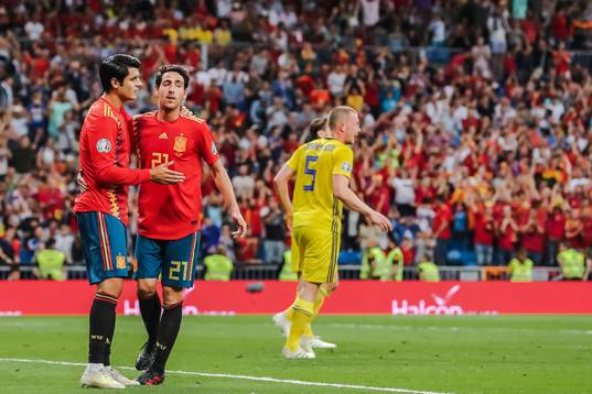 Alvaro Morata and Daniel Parejo of Spain celebrate