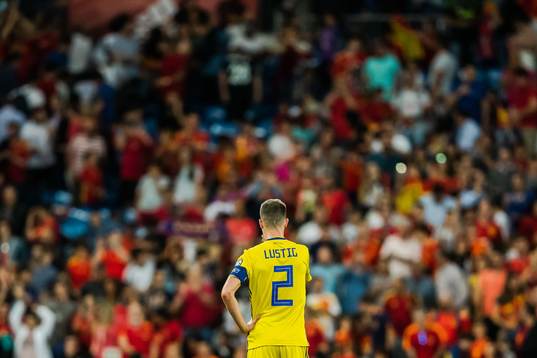 Mikael Lustig of Sweden looks dejected