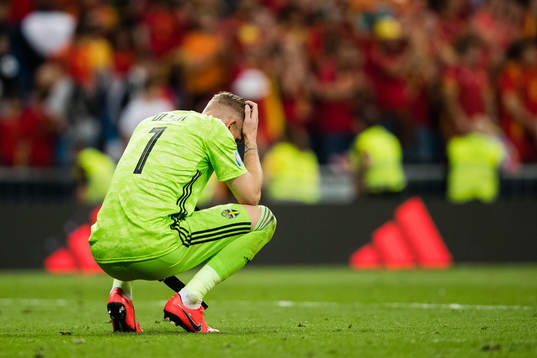 Goalkeeper Robin Olsen of Sweden looks dejected