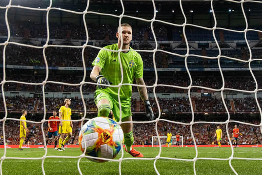 Goalkeeper Robin Olsen looks dejected
