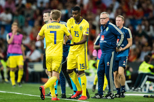 Sebastian Larsson chages with Alexander Isak