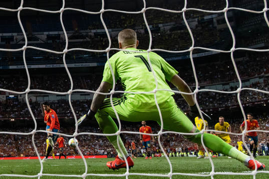 Alvaro Morata of Spain scores 2-0 behind goalkeeper Robin
