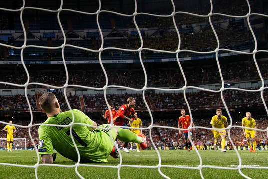 Sergio Ramos of Spain celebrates scoring 1-0 at a penalty