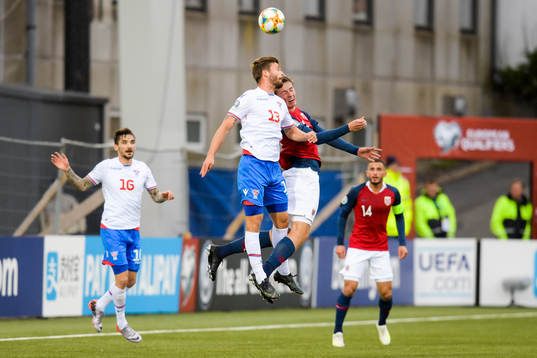 Rogvi Baldvinsson of Faroe Islands and Sander Berge of