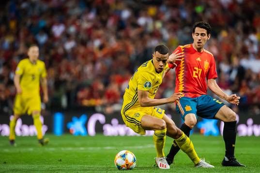 Robin Quaison of Sweden and Daniel Parejo of Spain