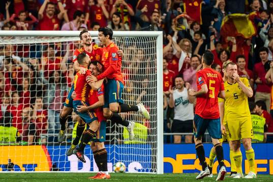 Mikel Oyarzabal of Spain celebrate with teammates