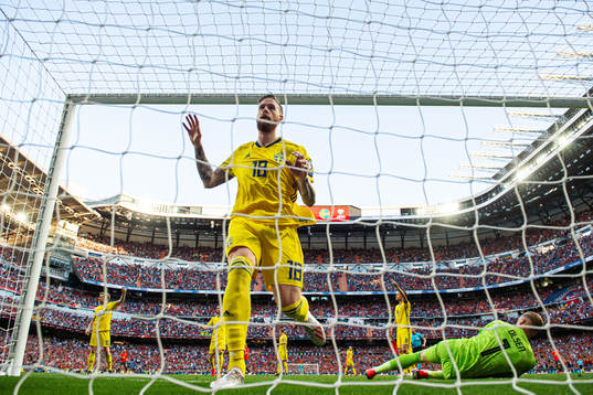 Pontus Jansson ans goalkeeper Robin Olsen of Sweden