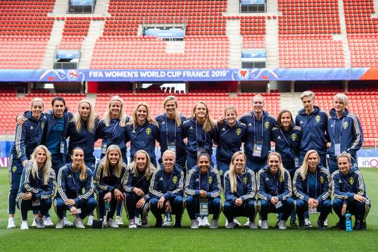 Team Sweden poses for a group photo