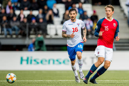 Rene Joensen of Faroe Islands and Sander Berge of Norway