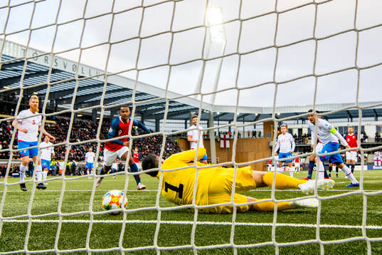 Bjørn Maars Johnsen of Norway (hidden) scores 0-2 behind