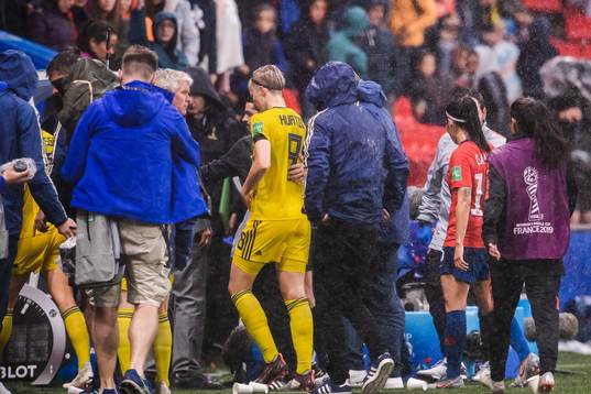 Lina Hurtig of Sweden leaves the pitch due to severe