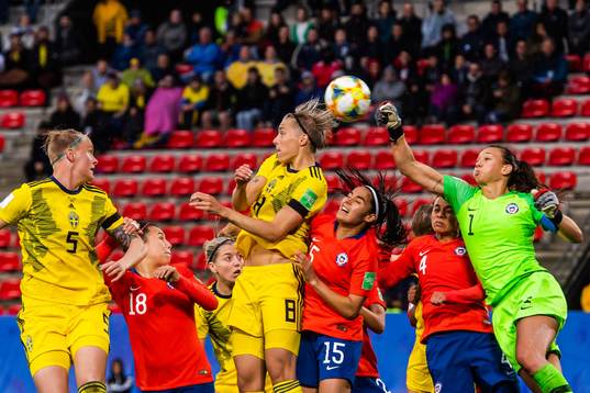 Nilla Fischer and Lina Hurtig of Sweden against goalkeeper