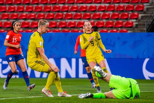 Nilla Fischer and Kosovare Asllani of Sweden