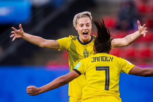 Lina Hurtig and Madelen Janogy of Sweden celebrate