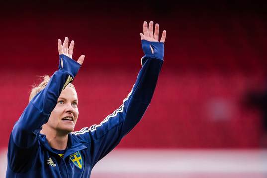 Nilla Fischer of Sweden celebrates