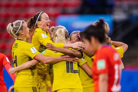 Madelen Janogy of Sweden celebrate with Kosovare Asllani