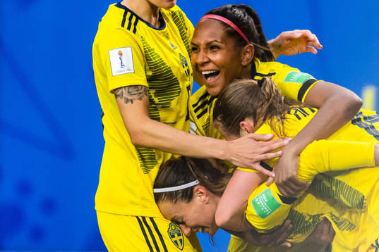 Madelen Janogy and Kosovare Asllani of Sweden celebrate the