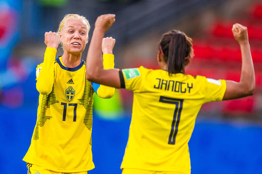 Caroline Seger and Madelen Janogy of Sweden celebrate