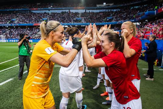Goalkeeper Ingrid Hjelmseth and Cecilie Redisch Kvamme of