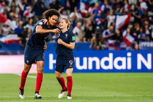 Wendie Renard and Eugénie Le Sommer of France  celebrate