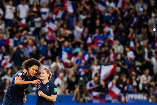 Wendie Renard and Eugénie Le Sommer of France  celebrate