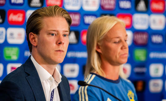 Press officer Fredrik Madestam and Caroline Seger of Sweden
