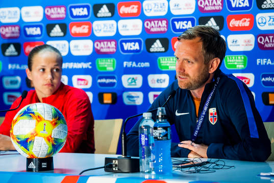 Guro Reiten of Norway and Martin Sjögren, head coach of