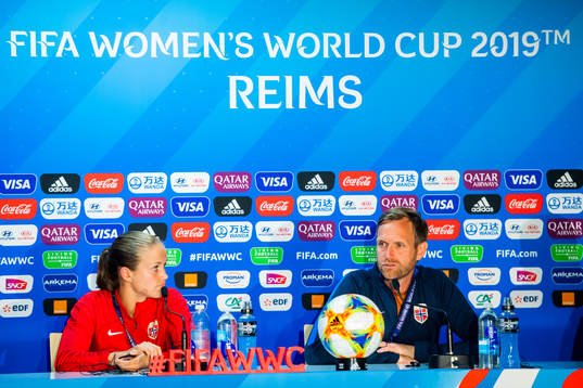 Guro Reiten of Norway and Martin Sjögren, head coach of