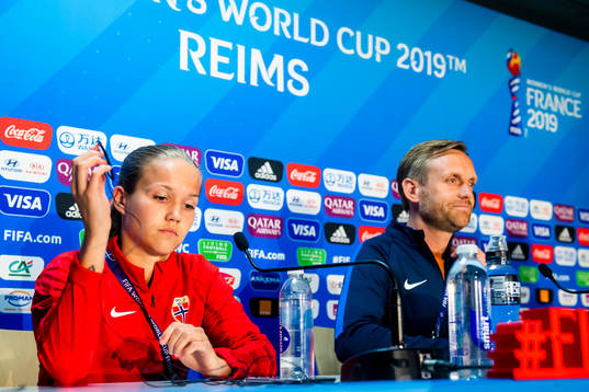 Guro Reiten of Norway and Martin Sjögren, head coach of