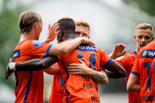 Pape Habib Gueye of Aalesund celebrates with teammates