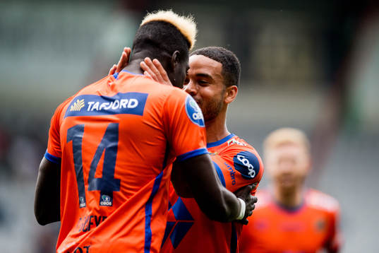 Pape Habib Gueye of Aalesund celebrates with teammate
