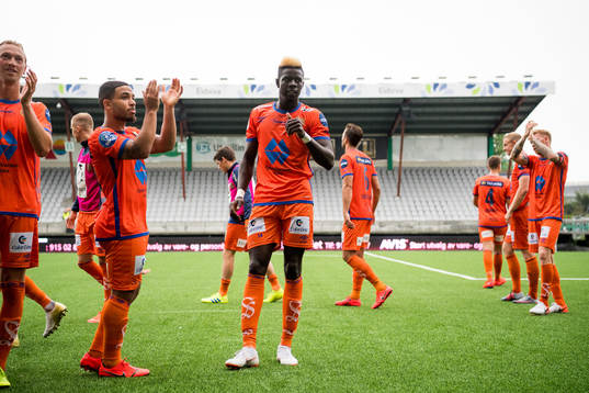 Pape Habib Gueye of Aalesund celebrates with teammates
