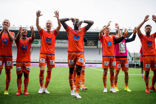 Pape Habib Gueye of Aalesund celebrates with teammates