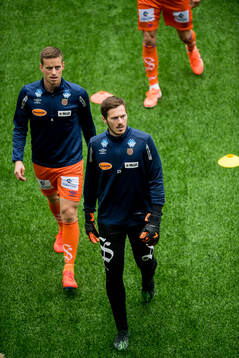 Jonas Grønner and goalkeeper Tarjei Aase Omenås of