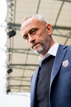 Lars Bohinen, head coach of Aalesund, enters the pitch
