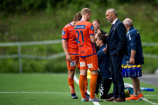 Peter Orry Larsen of Aalesund and Lars Bohinen, head coach